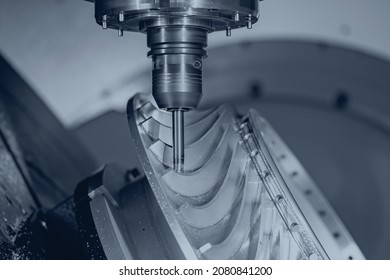 CNC precision metalworking machine Process of manufacturing turbine blades for pump or aircraft. Industry automation factory mill drill technology work.
