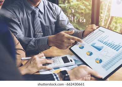 Co Working Conference, Business Team Meeting Present, Investor Colleagues Discussing New Plan Financial Graph Data On Office Table With Laptop And Digital Tablet, Finance, Accounting, Investment.