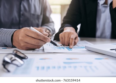 Co working conference, Business team meeting present, investor colleagues discussing new plan financial graph data on office table with laptop and digital tablet, Finance, accounting, investment.