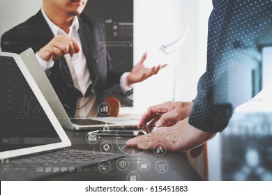 co working team meeting concept,businessman using smart phone and digital tablet and laptop computer in modern office with virtual graph chart and icon diagram   