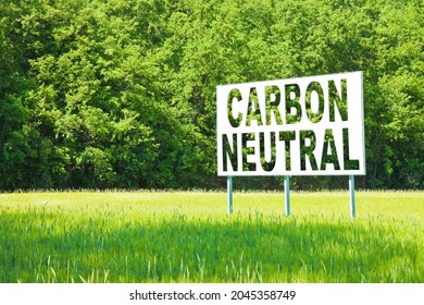CO2 Carbon Neutral concept against an advertising billboard immersed in nature - Shutterstock ID 2045358749