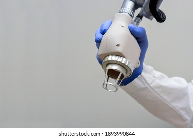 CO2 Fractional Laser Hand Piece in Doctors Hand - Shutterstock ID 1893990844