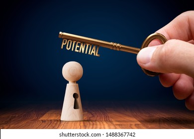 Coach has a key to unlock potential - motivation concept. Coach (manager, mentor, HR specialist) unlock leader potential and talent represented by wooden figurine and hand with key.