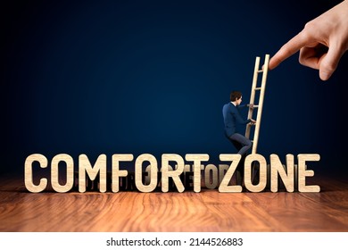 Coach motivate to leave comfort zone and take an opportunity for personal growth. Helping hand concept with businessman climb the ladder.
