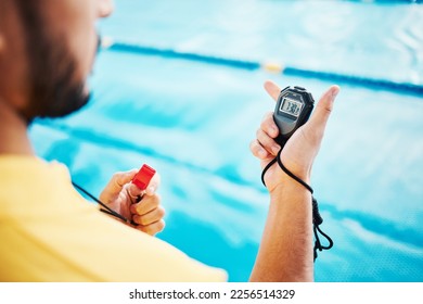 Coach, swimming pool and timer in hands for training, water exercise and health sports with lifeguard professional. Practice, competition and fitness person hand holding stopwatch on blue background - Powered by Shutterstock