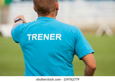 Coach while working on the field - Powered by Shutterstock