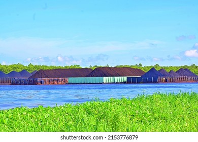 Coal Barge Anchored On The Barito River