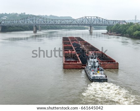 Coal barge and pusher boat on Ohio River