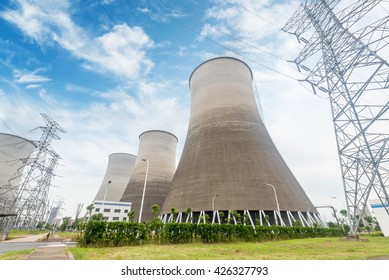 Coal Fired Power Station With Cooling Towers Releasing Steam Int