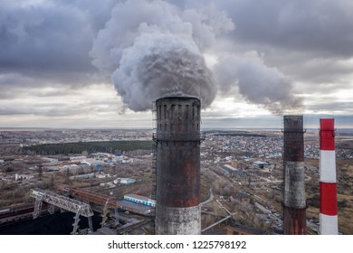 Coal fossil fuel Power Plant smokestacks emit carbon dioxide pollution