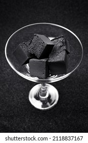 Coal for hookah. Coal for a hookah on a gray background.
