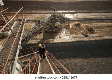 Coal Mine Field Photographed With A Wide Angle Lens From A Top Of Huge Drill Machine. Bird Perspective.