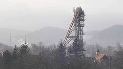 Coal Mine Shaft On Hilly Area In Poland In Foggy Winter Day