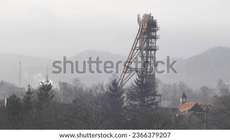 Coal Mine Shaft on Hilly Area in Poland in Foggy Winter Day