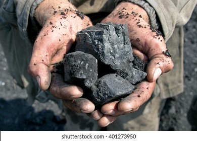 coal miner in the hands of - Shutterstock ID 401273950