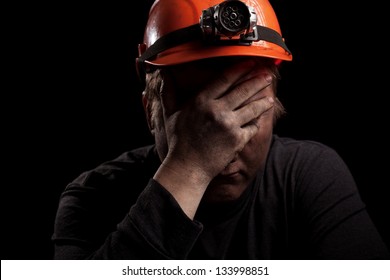 Coal Miner On A Black Background