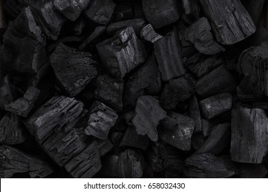 Coal mineral black as a cube stone background. Coal pattern