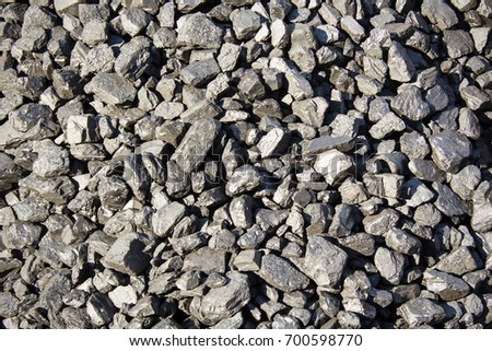 Coal mineral black cube stone background. textured
