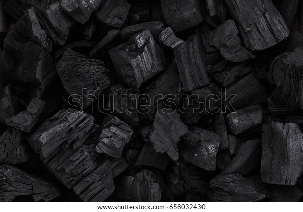 Coal mineral black as a cube stone background.\
Coal pattern