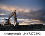 Coal mining in an open-pit. Excavator on Coal mining. Excavator digging in open pit coal mine. Excavator in open-pit on sunset background. Heavy machinery in opencast. Earthmover on earthmoving