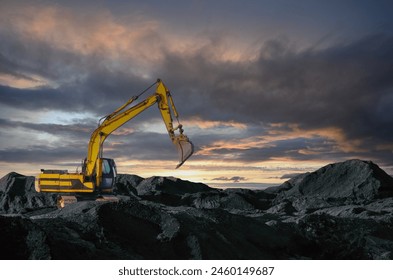 Coal mining in an open-pit. Excavator on Coal mining. Excavator digging in open pit coal mine. Excavator in open-pit on sunset background. Heavy machinery in opencast. Earthmover on earthmoving