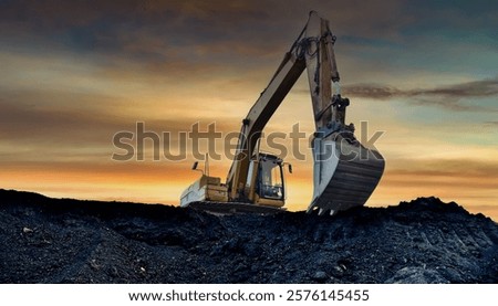 Coal mining in an open-pit. Excavator on Coal mining. Excavator digging in open pit coal mine. Excavator in open-pit on sunset background. Heavy machinery in opencast. Earthmover on earthmoving