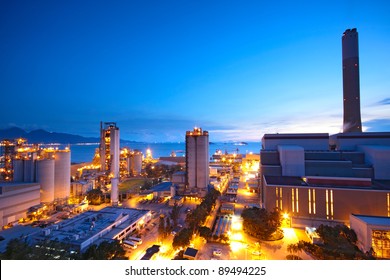 Coal Power Station And Night Blue Sky