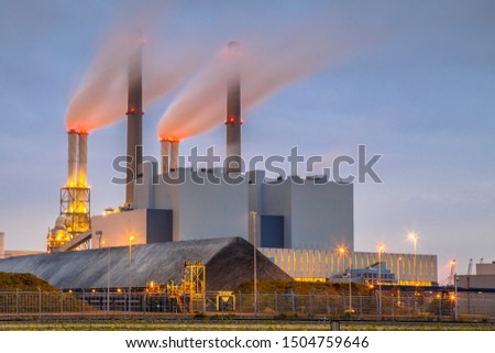 Coal powered electicity power plant in Europoort area with supply in foreground, Maasvlakte Rotterdam Netherlands