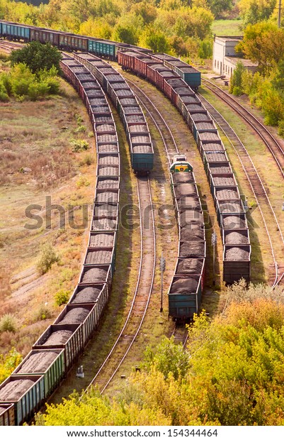 Coal train on railway\
tracks