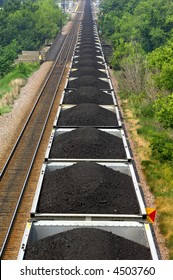 Coal Train Running In The Midwest.