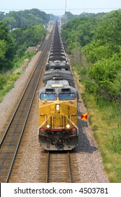 Coal Train Running In The Midwest.