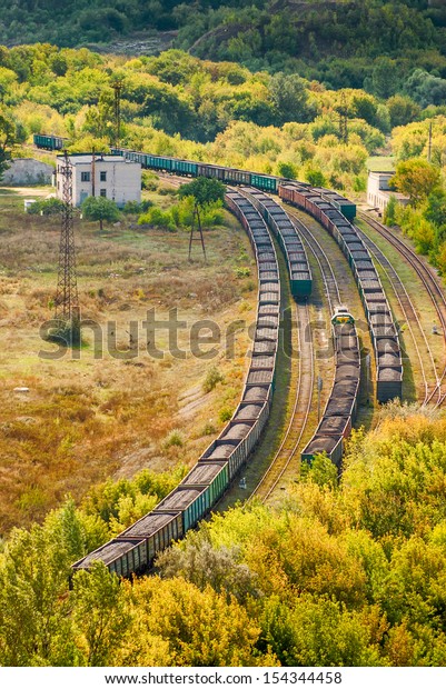 Coal trains on\
railway tracks on a\
station