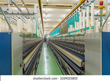 Coarse cotton factory in spinning production line and a rotating machinery and equipment production company - Powered by Shutterstock