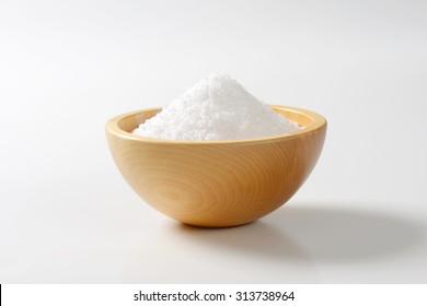 Coarse grained salt in wooden bowl - Powered by Shutterstock