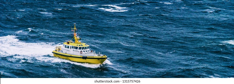 Coast Guard Boat Patrol Riding On Rough Sea Waves In Alaska. Panoramic Banner Background.