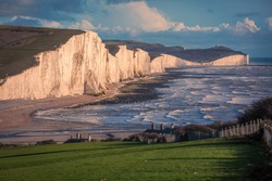The Coast Guard Cottages And Seven Sisters Chalk Cliffs Just Outside Eastbourne, Sussex, England, UK.