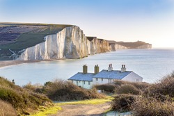The Coast Guard Cottages & Seven Sisters Chalk Cliffs Just Outside Eastbourne, Sussex, England, UK.