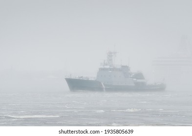 Coast Guard Ship Sailing During The Storm. Winter. Fog, Waves, Rough Weather. Baltic Sea.  