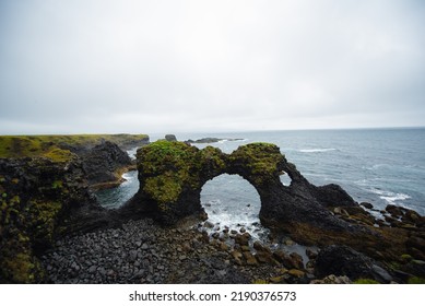 The Coast Of Iceland With A Rock Formation