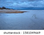 Coast of the Parnu Bay in evening in overcast whether. It a bay in the northeastern part of the Gulf of Livonia (Gulf of Riga of Baltic Sea), in southern Estonia.