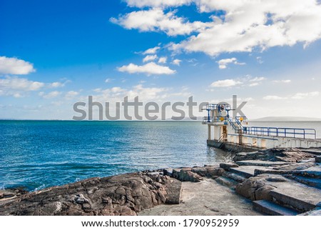 The coast in Salthill overlooking Galway Bay, Ireland, along the Promenade in a sunny bright day