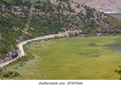 Coast of Skadarsko lake. Aerial view on route to Podgorica. - Shutterstock ID 87597646