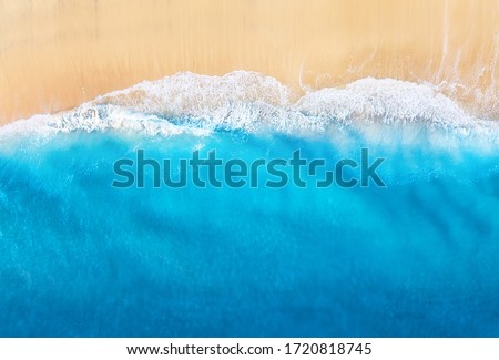 Coast with waves as a background from top view. Blue water background from drone. Summer seascape from air. Travel - image