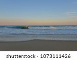 Coast Waves At Sunset