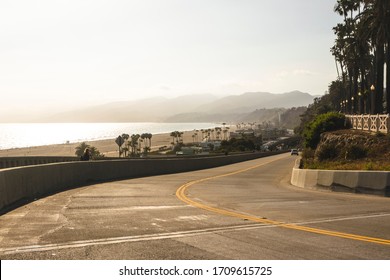 Coastal Avenue Overlooking The Beach And Ocean In Santa Monica. Palms And Hills In California. Beautiful Landscape.