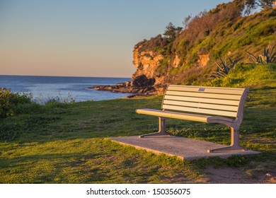 Coastal bench sunrise - Powered by Shutterstock