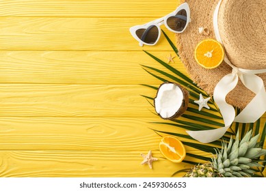 Coastal bliss captured: Top view of sunhat, sunglasses, delicious exotic fruits, island trinkets, palm frond, starfish on sunny wooden surface, offering space for customized text or advertisements - Powered by Shutterstock