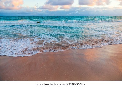 Coastal Caribbean Landscape With Shore Waves And Wet Sand On A Sunrise. Dominican Republic. Bavaro Beach