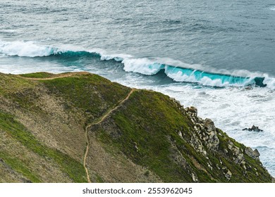 Coastal Cliff with Waves and Hikers Overlooking the Ocean - Powered by Shutterstock