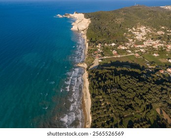 Coastal cliffs, turquoise sea, and a village nestled in lush greenery. - Powered by Shutterstock